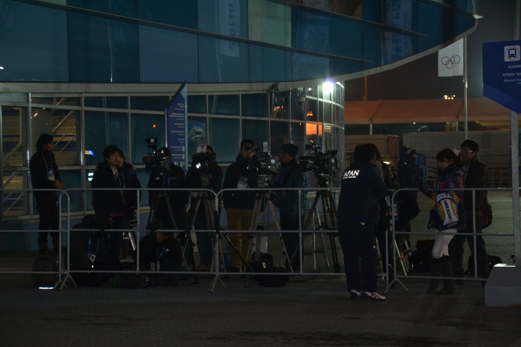 At the exit of the ice rink, Japanese TVs wait for their athletes